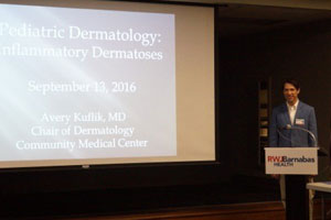 Dr. Avery Kuflik giving a pediatric lecture to the pediatric department at Community Medical Center 