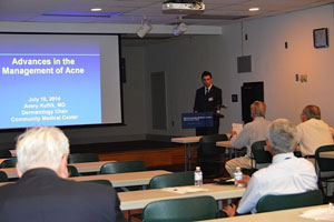 Dr. Avery Kuflik at Community Medical Center event.